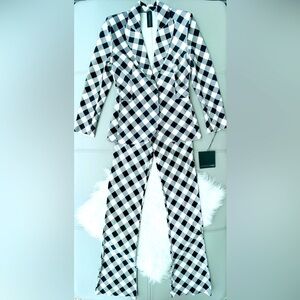 nwt!
norma kamali
single breasted jacket + boot pant
black buffalo check
XS